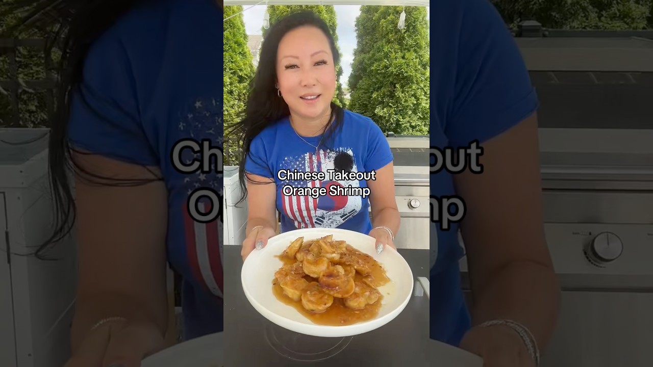 Crispy Chinese takeout orange shrimp coated in sticky orange sauce